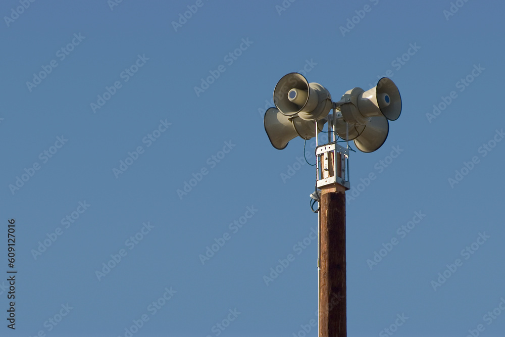 Speakers ready to announce something good, or perhaps an emergency.