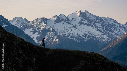 A man running in the Alps, France