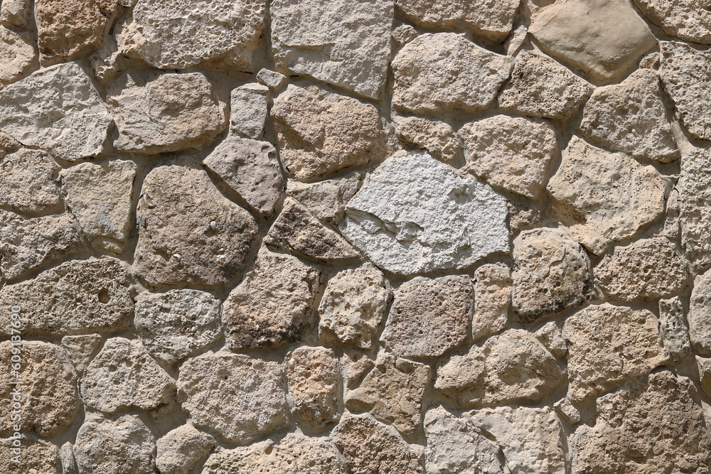 Obraz premium old wild stone wall without mortar 