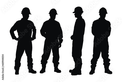 Construction workers wearing uniforms and standing silhouette bundles. Men bricklayers with anonymous faces. Male Mason silhouette on a white background. Male bricklayer silhouette collection.