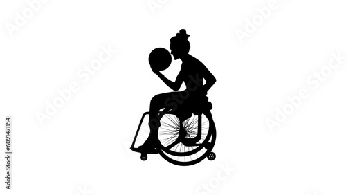 sporty woman in a wheelchair play basketball