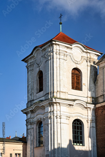 historic bell tower of the baroque catholic church in the city of Poznan
