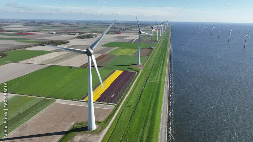Green sustainable wind turbine aerial.