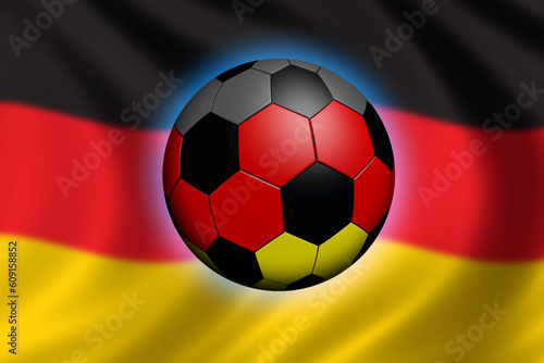 Soccer in Germany - soccer ball and flag of germany  flag out of focus 