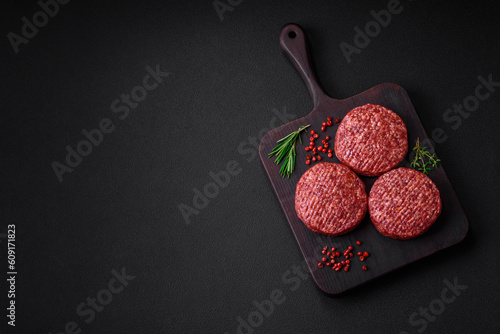 Konstfotografi Fresh raw ground beef burger patty with salt and spices