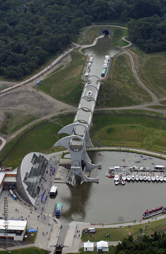 Aerial view of The Falkirk Wheel, the world's only rotating boatlift which connects the Forth and Clyde Canal with the Union Canal between Edinburgh and Glasgow in Scotland. The wheel is 30 mteres hig photo