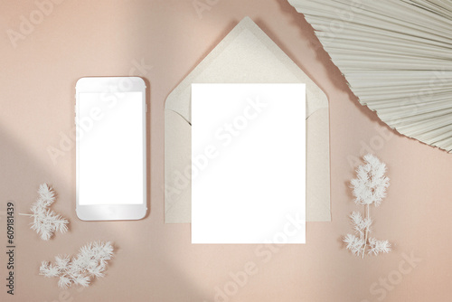 Wedding stationery suite cards styled with minimalist boho decor and on-trend shadow photography. 5x7 invitation card and smartphone cell mobile phone evite mockup. 