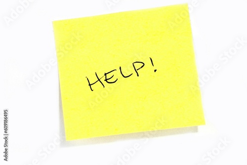 Sticky post it note with "Help" wording.