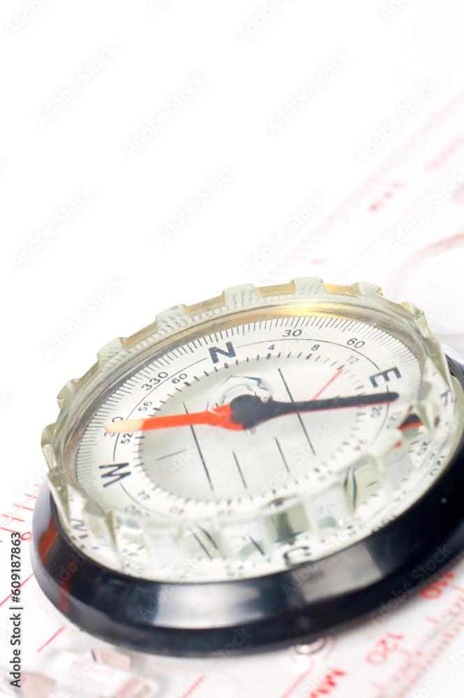 Compass with focus on the north over a white background. Small DOF Compass with focus on the north over a white background. Small DOF