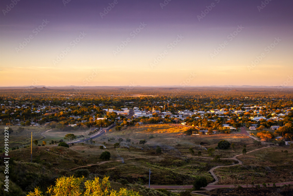 Charters Towers, Queensland, Australia. Taken from the lookout at dusk looking over the town with the horizon and sky in the background.