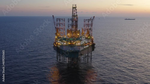 Wallpaper Mural Aerial view of offshore jack up drilling rig during early night time - oil and gas industry
 Torontodigital.ca