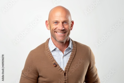 Portrait of a happy mature man smiling at the camera on white background