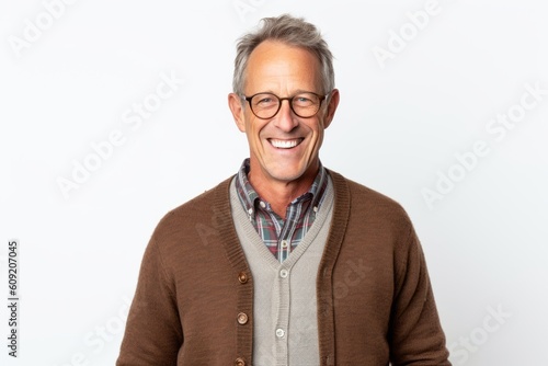 Portrait of happy senior man with eyeglasses smiling on white background