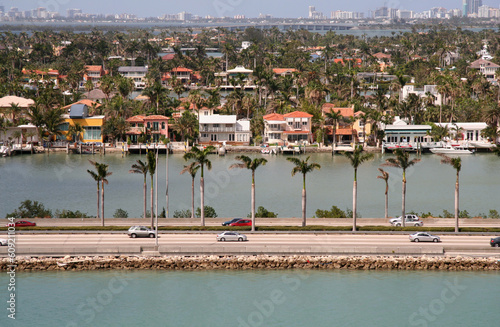 Miami Floriday Landscape with Roadway and Expensive Homes photo