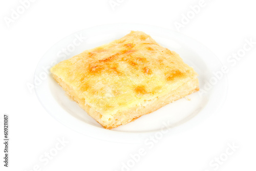 Freshly baked  piece of cheese pie isolated on a white background