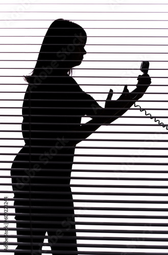 isolated on white silhouette of woman on the phone (blind)