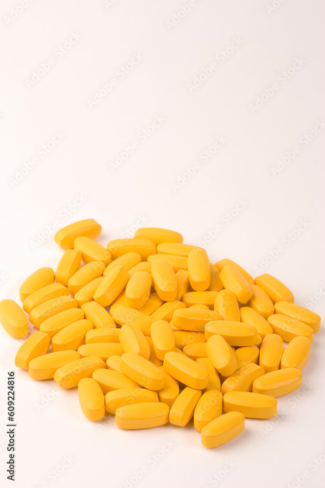 Multiple Pills or tablets against a plain background Multiple Pills or tablets against a plain background