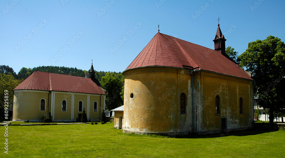 old chapels in Svidnik, Slovakia;  clear blue sky, green grass