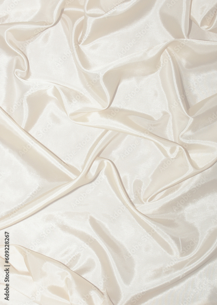 Background made of wrinkled white shiny silk