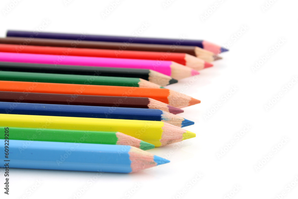 Colored pencils on a white background with a shallow DOF Colored pencils on a white background with a shallow DOF