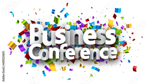 Banner with business conference sign over colourful foil cut ribbon confetti background.