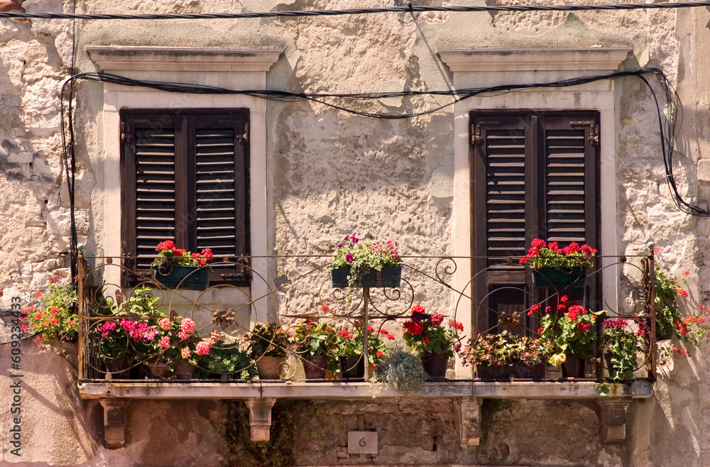 A couple of old windows in Pula in Croatia