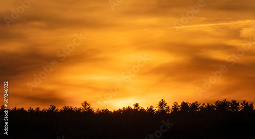 Orange sunset over Quabbin reservoir, MA