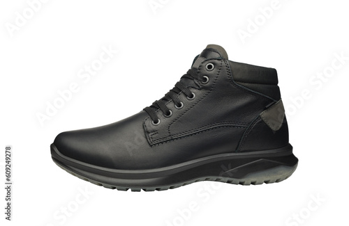 Men leather waterproof winter trekking shoe isolated on white background. New sports hiking boot with shoelaces - side view. Unisex shoes for cold weather. Full depth of field. High quality photo.
