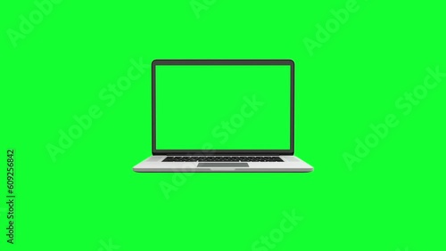 Laptop isolated on a green background opens and a blank green chrome key screen lights up. Concept Computer Technological on Video Call Close-Up 4K