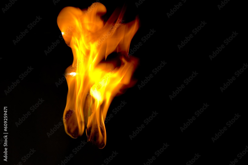 Fototapeta premium Big fire flames isolated on black