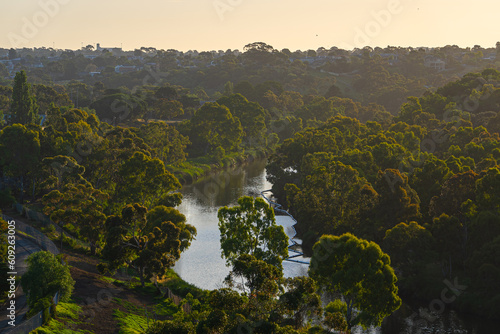Maribyrnong River flowing between trees in Essendon West, Melbourne, Australia