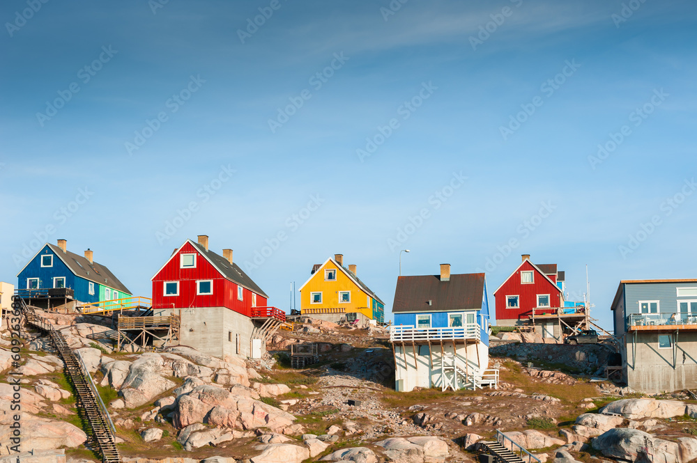 Colorful houses on the shore of Atlantic ocean in Ilulissat, Greenland.