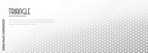 grey and white triangle pattern wide banner in halftone style