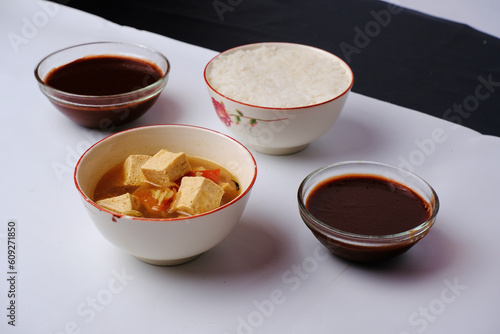 this is tofu sauce, eggs, white rice and jelly as a delicious food