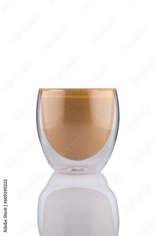 Coffee, coffee drink, cocoa in a transparent glass with reflection on a white background Coffee, coffee drink, cocoa in a transparent glass with reflection on a white background