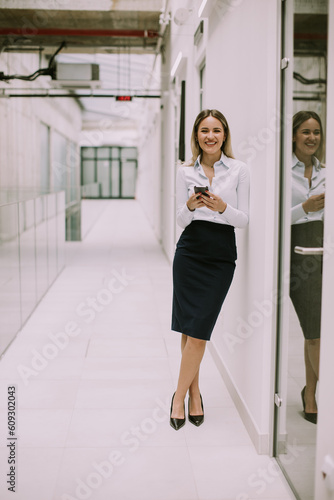 Young business woman using ...