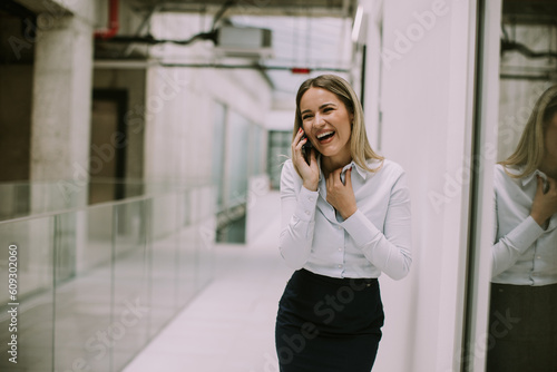 Young business woman using ...