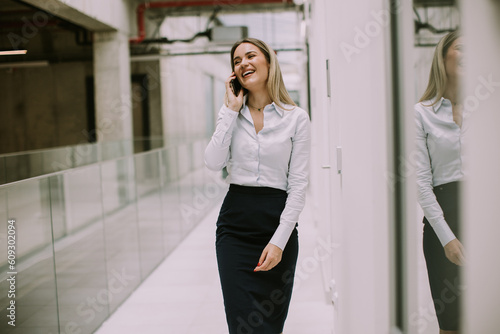 Young business woman using ...