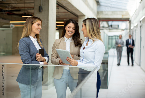 Three young business women ...