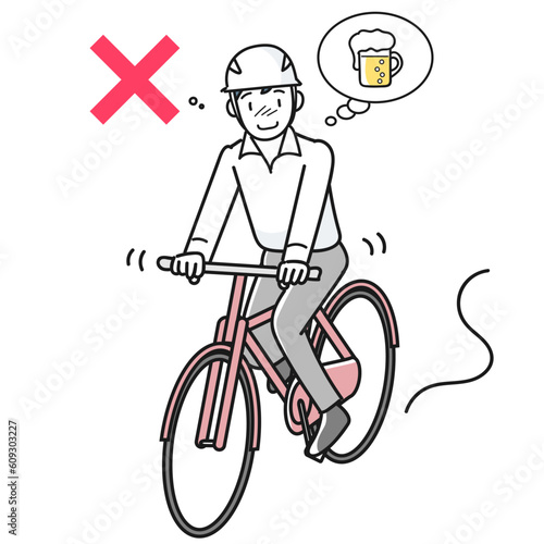 酒気帯びで自転車に乗る若い男性