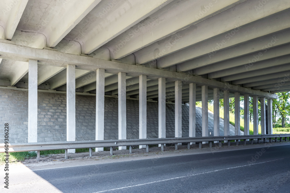 concrete columns like pillars of an automobile bridge concrete columns like pillars of an automobile bridge