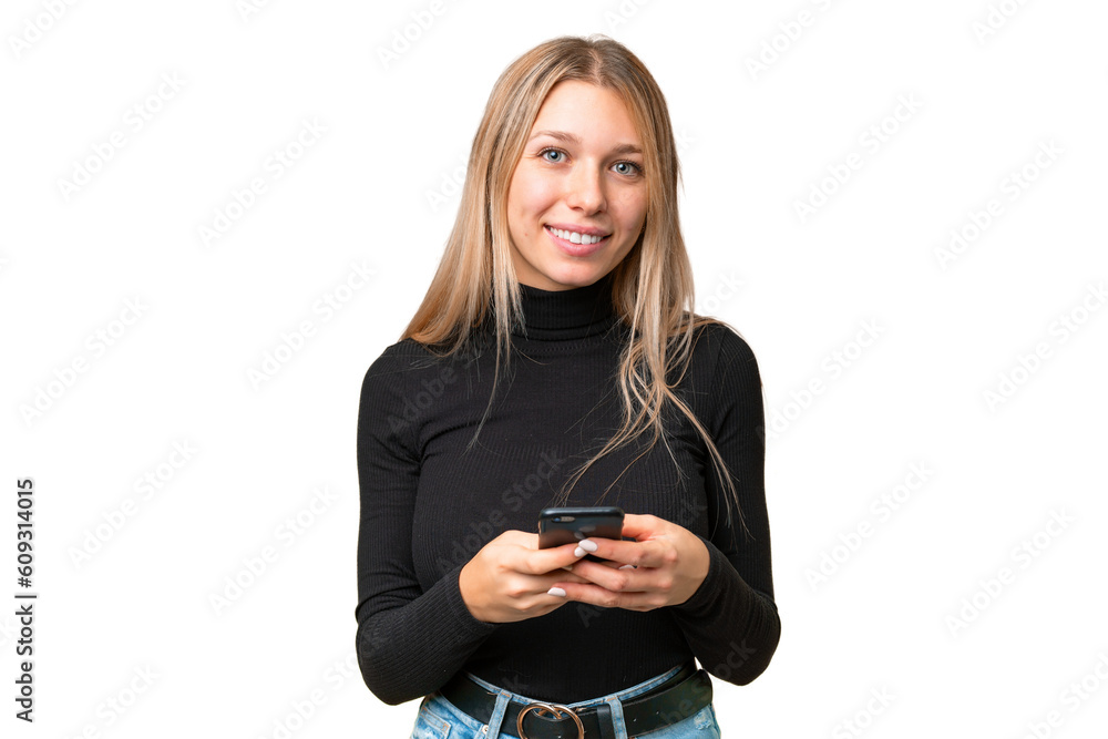 Young pretty blonde woman over isolated chroma key background sending a message with the mobile Young pretty blonde woman over isolated chroma key background sending a message with the mobile