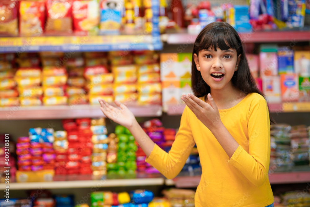 Indian girl giving shocking reaction at grocery shop.