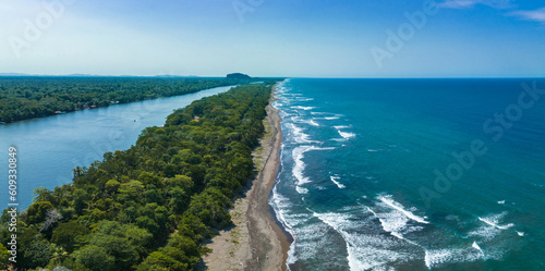 Caribbean sea on the one side, village Tortuguero inside the jungle in the middle, and huge river on the otjer side. Amazing place full of wildlife in Costa Rica photo