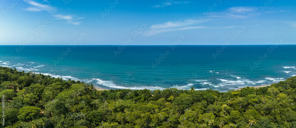 Fototapeta premium Caribbean sea on the one side, village Tortuguero inside the jungle in the middle, and huge river on the otjer side. Amazing place full of wildlife in Costa Rica