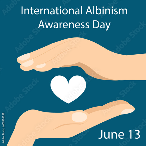 International Albinism Awareness Day. Hands protecting a white heart. Genetic rare disorder.