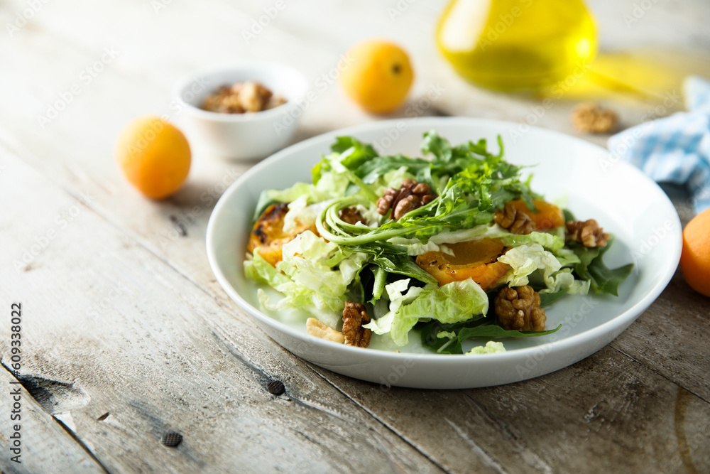 Healthy leaf salad with apricot and walnut Healthy leaf salad with apricot and walnut