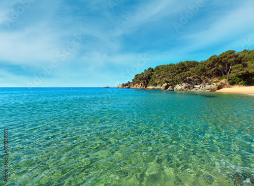 Mediterranean sea rocky coast summer view with sandy beach  Costa Brava  Catalonia  Spain.
