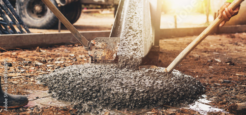 Contractors are pouring cement floors