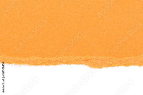 Single piece of isolated ripped crumpled blank orange paper with copy space for text, top view from above on white or transparent background
